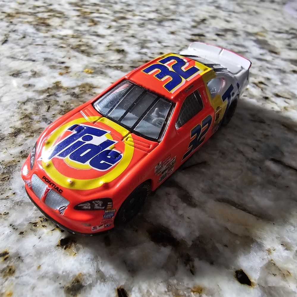 Ricky Craven's #32 Tide car Replica from the 2003 NASCAR season. 1:64 Scale NWT